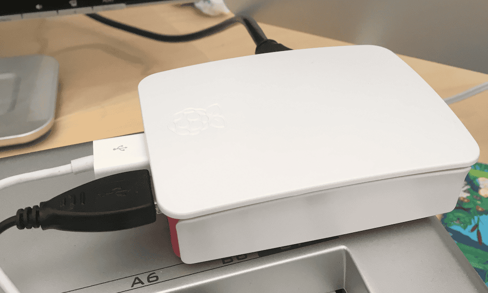 Why I changed my Hearth TV Stick to a Raspberry Pi media server a raspberry pi in its case with leads coming out of it.png