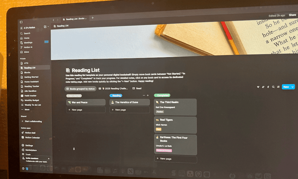 a book tracker in notion on a desktop computer.png