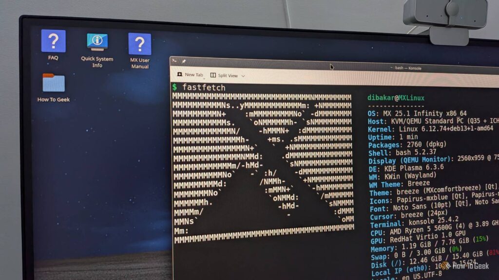 a desktop pc with mx linux running and fastfetch showing the mx logo.jpg