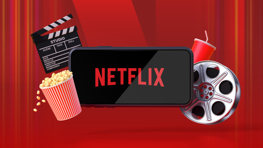 a smartphone displaying the netflix logo surrounded by a popcorn bucket a film reel a clapperboard a.png