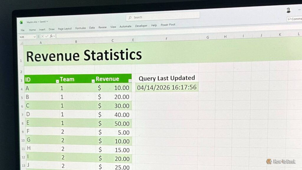 laptop screen showing a power query output in excel and a cell labeled query last updated.jpg