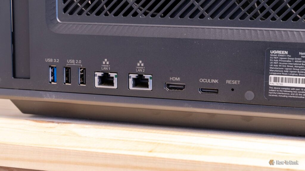 the rear io panel of the ugreen idx6011 pro nas showing usb dual 10gbe lan hdmi and oculink ports.jp .jpeg