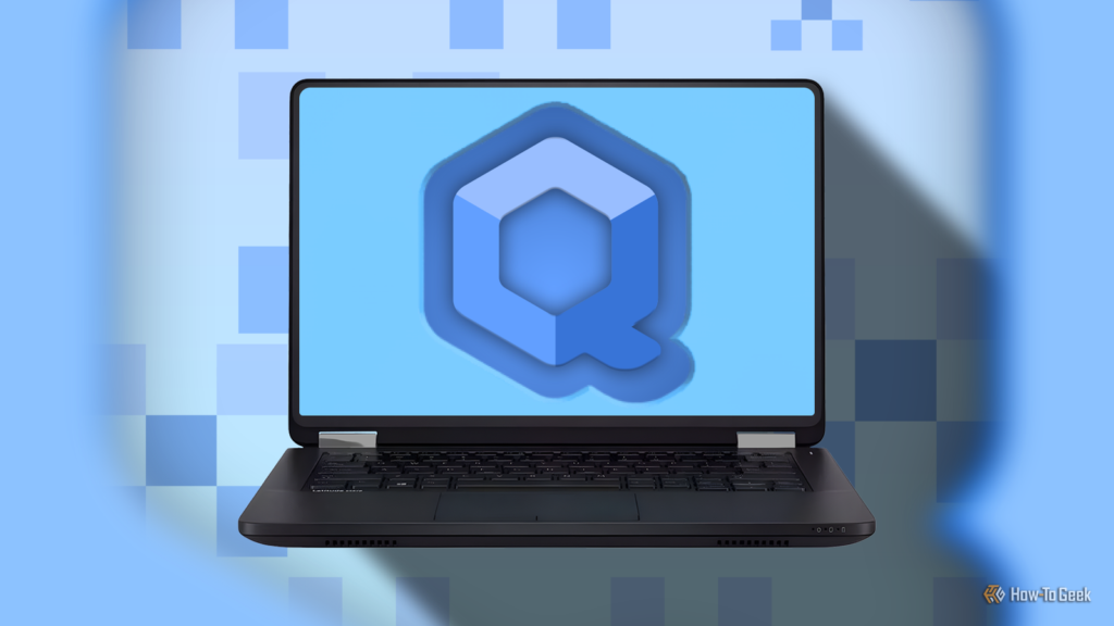 a laptop displaying the qubes os logo with a background of abstract cube patterns in shades of blue.png