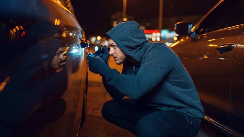 Automotive thieves are counting for your summer season holiday—this is the right way to prevent them car thief at night.jpg
