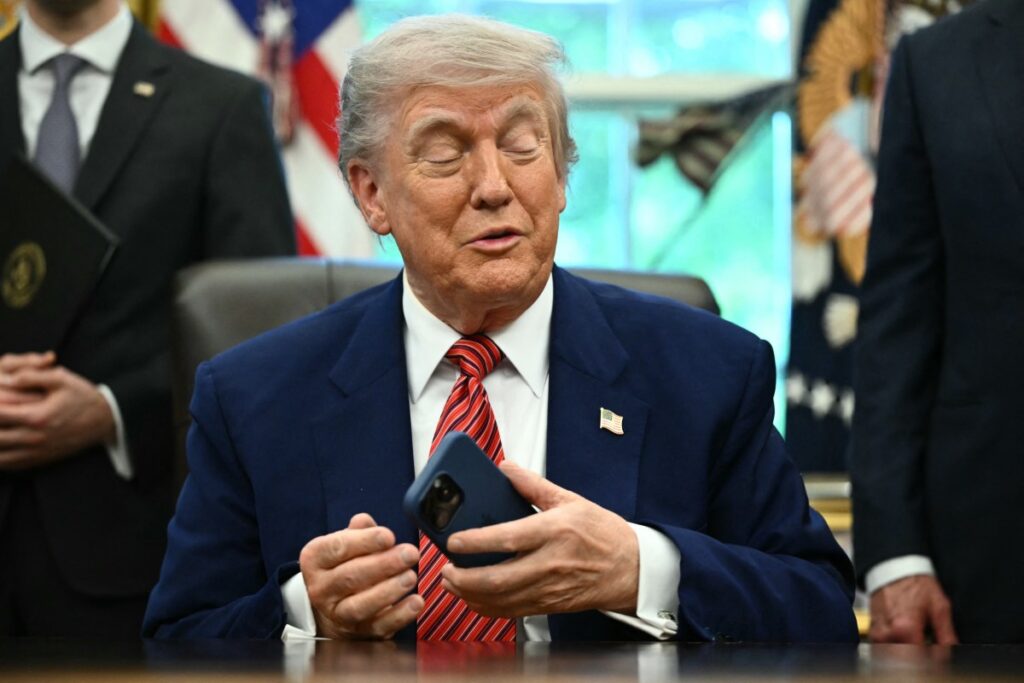 The Trump management would possibly take an fairness stake in OpenAI donald trump cellphone.jpg