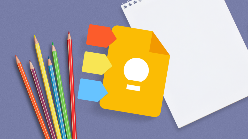 google keep icon with colorful label tags attached to its side placed next to colored pencils and a.png