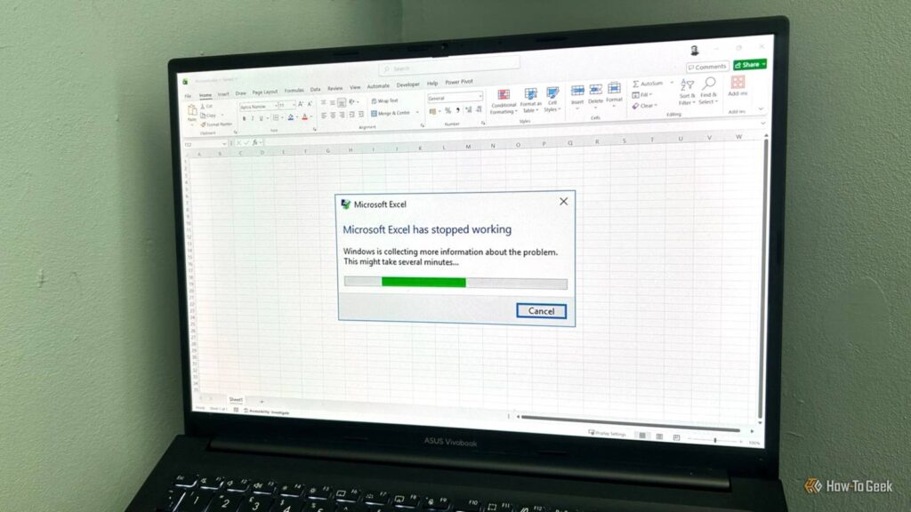 laptop screen showing the microsoft excel has stopped working alert on a blank excel worksheet.jpg