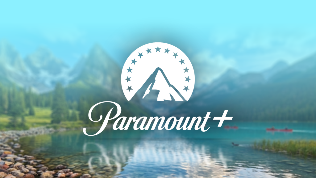 paramount plus logo centered over a blurred landscape of mountains and a lake.png
