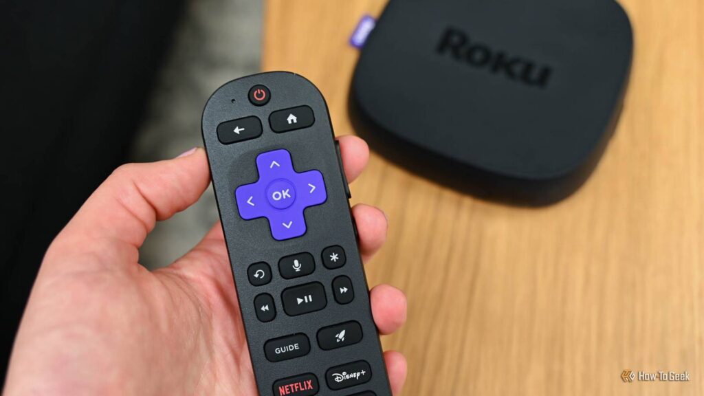 3 streaming upgrades that reworked my setup person using the voice remote pro with the roku ultra 2 54022659777 o.jpg