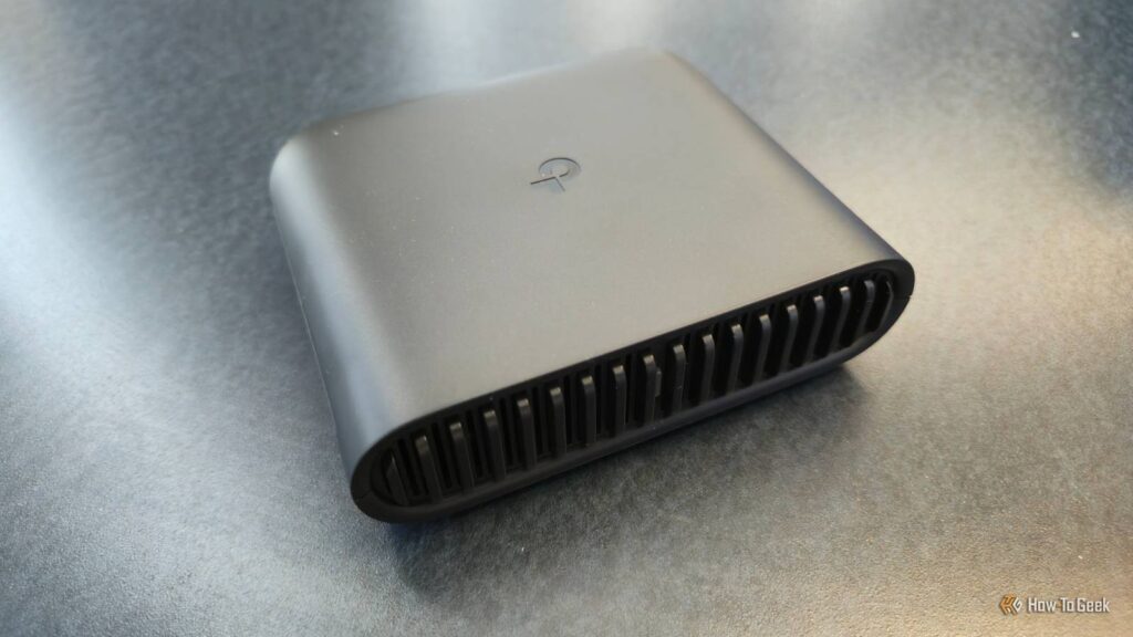 tp link ax3000 travel router on a table.jpg