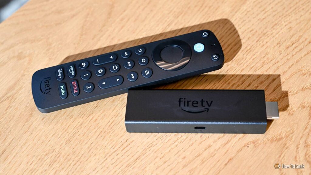 Do not throw away your outdated Fireplace TV Stick, it is extra treasured than ever ahead of amazon alexa voice remote pro sitting next to an amazon fire stick.jpg