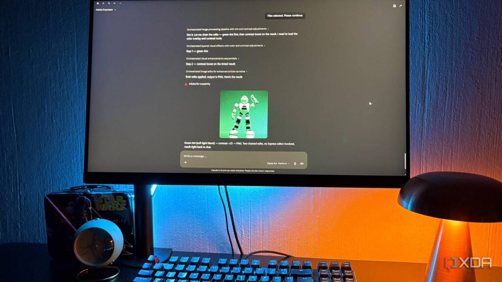 claude adobe connector on desktop pc clock and lamp in view.jpeg