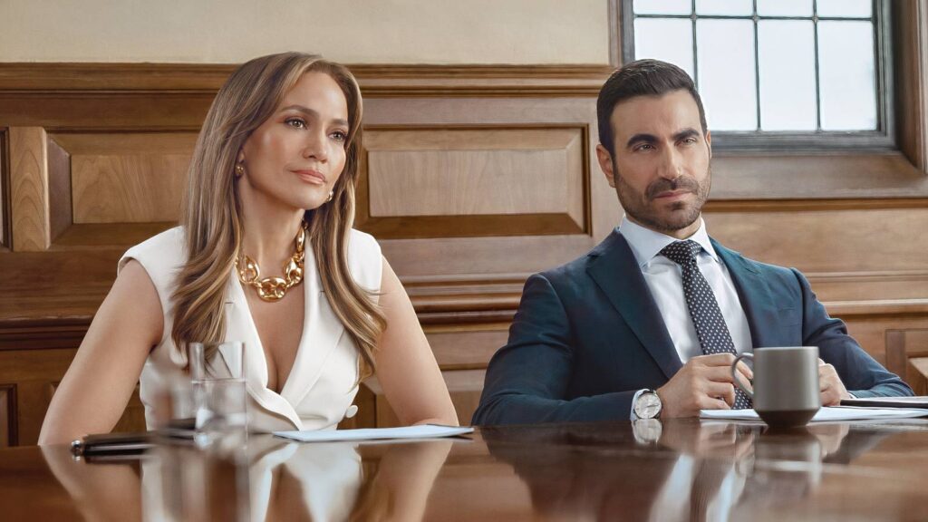 5 new motion pictures to observe this week throughout Netflix, HBO Max, and extra (June 1-7) jennifer lopez and brett goldstein sitting next to each other in office romance.jpg