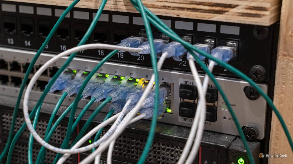 unifi us 48 500w managed poe network switch with ethernet cables and sfp ports 1.jpg